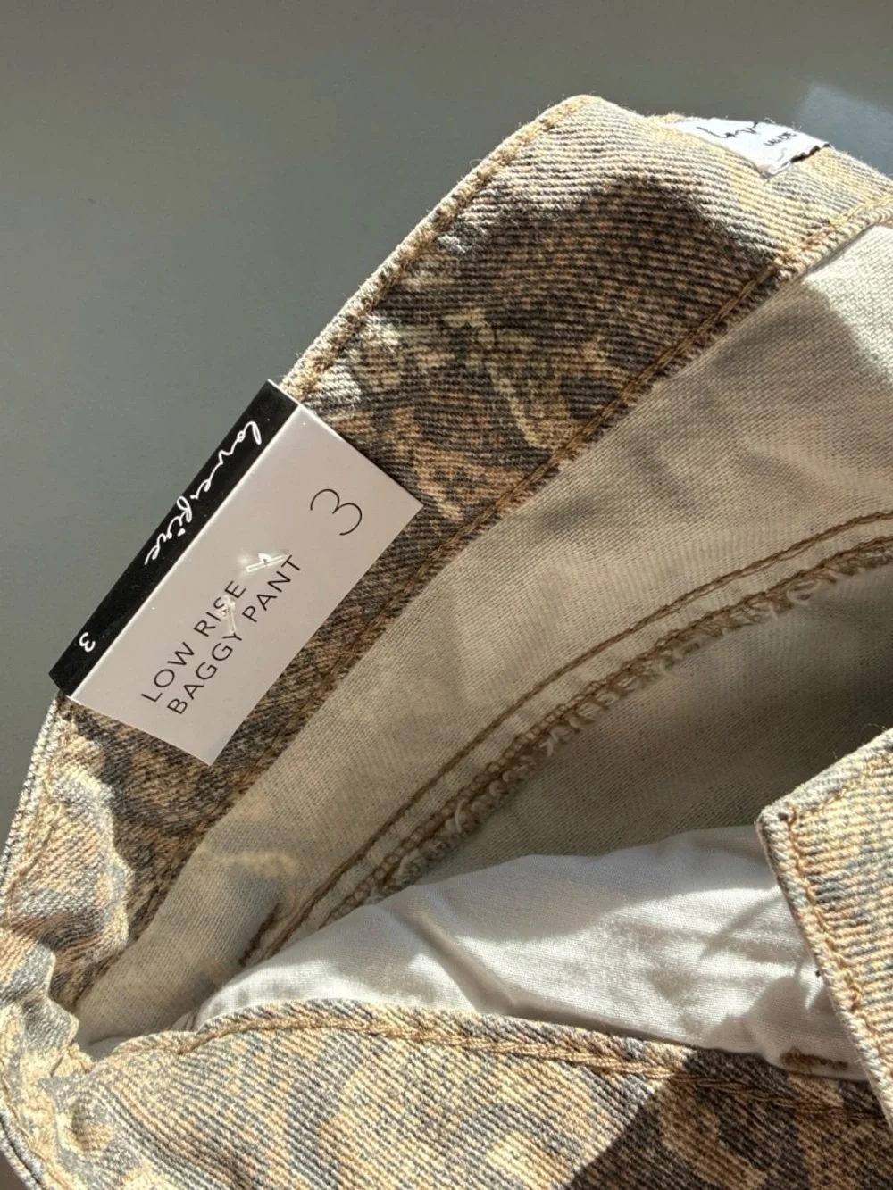 Snakeskin reptile print jeans